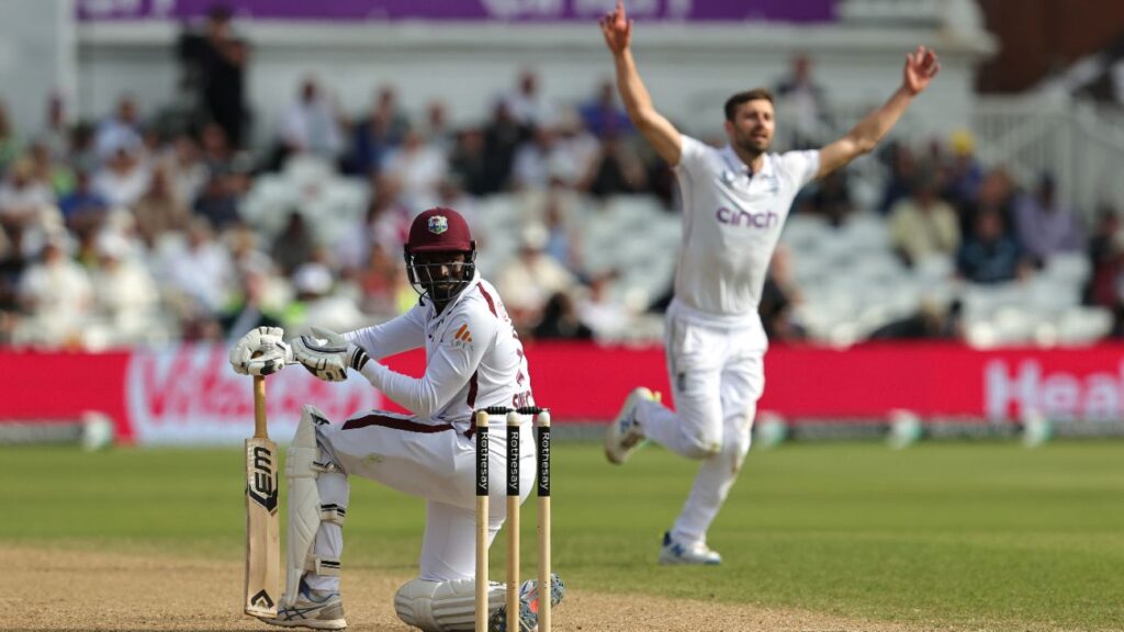 After feeling Mark Wood's temperature, Kevin Sinclair left with a damaged arm.