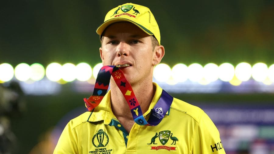 Adam Zampa has a nibble of his World Cup medal, India vs Australia, Men's ODI World Cup final, Ahmedabad, November 19, 2023