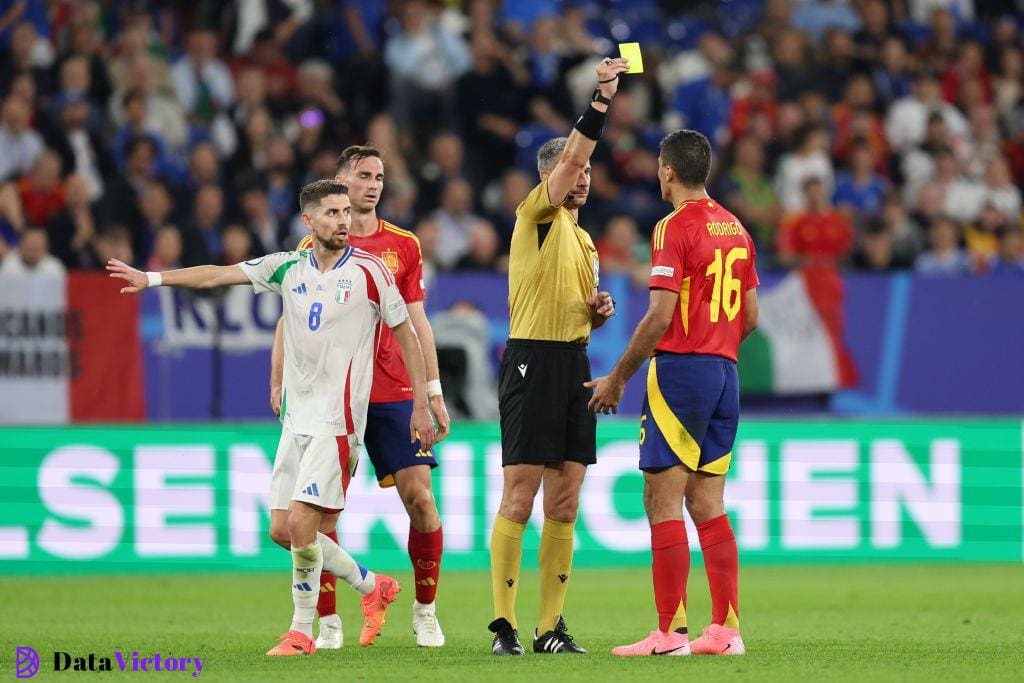 Referee Slavko Vincic shows Rodri of Spain a yellow card during the UEFA EURO 2024 group stage match between Spain and Italy at Arena AufSchalke on June 20, 2024 in Gelsenkirchen, Germany. (Photo by Matt McNulty - UEFA/UEFA via Getty Images) Albania Euro 2024