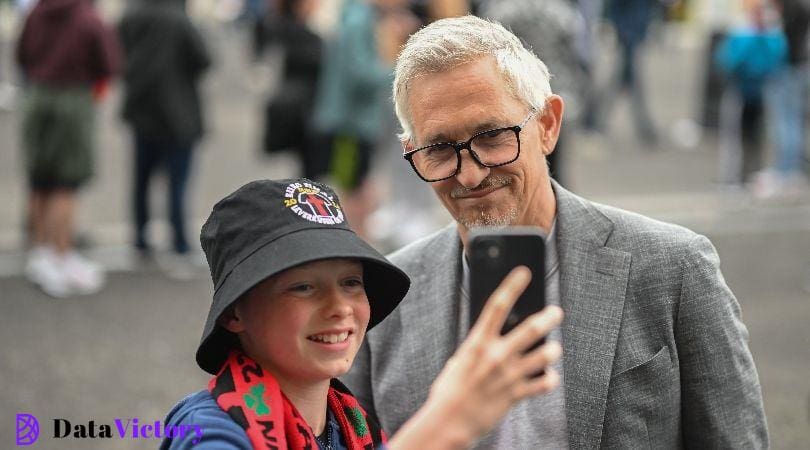 Gary Lineker, who is presenting for the BBC at Euro 2024, poses for a selfie with a young fan ahead of the Europa League final in Dublin in May 2024.