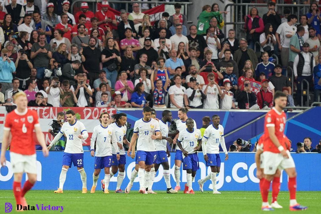 France's players celebrate a narrow win over Austria