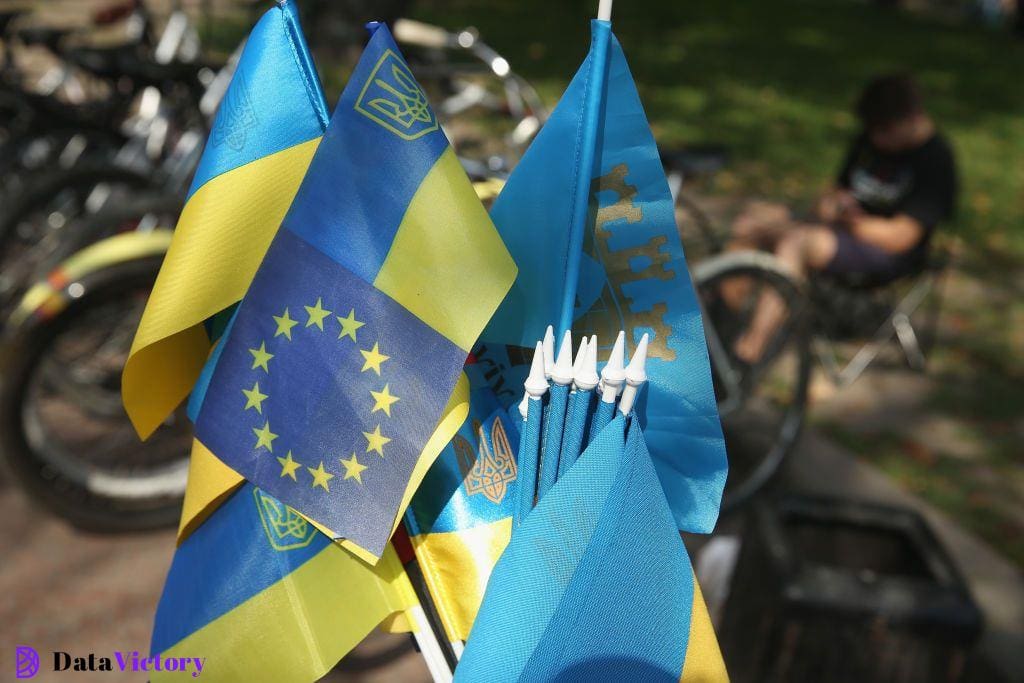 A Ukrainian flag mixed with the flag of the European Union stands among flags for sale at a vendor's stall on September 14, 2014 in Lviv, Ukraine. The European Union announced today that it will delay implemenation of the EU association agreement, which would promote free trade between the EU and Ukraine, until the end of 2015 in a move meant to address concerns by Russia.