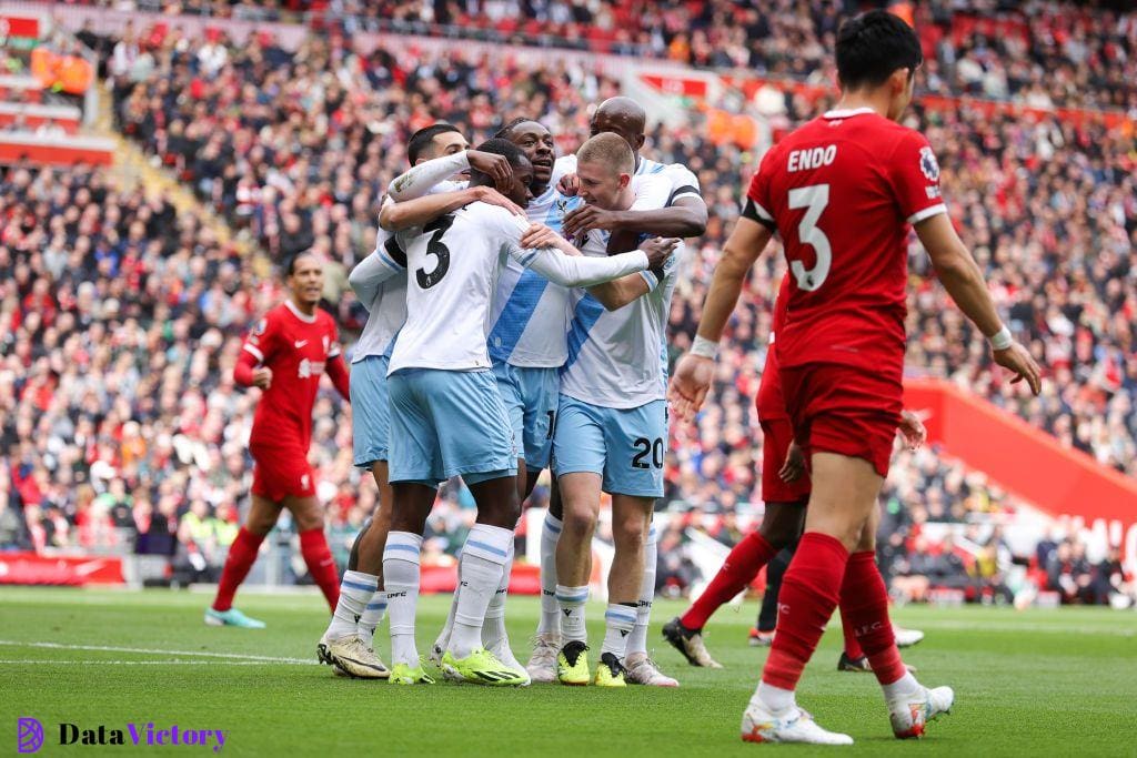 Eberechi Eze of Crystal Palace celebrates after scoring his side's first goal during the Premier League match between Liverpool FC and Crystal Palace at Anfield on April 14, 2024 in Liverpool, England.