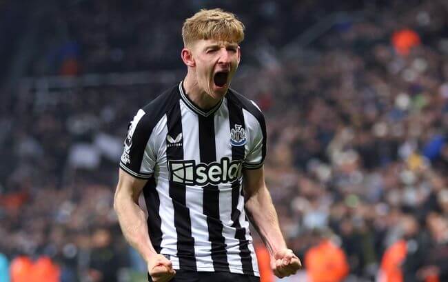 Anthony Gordon celebrates after scoring against Manchester United