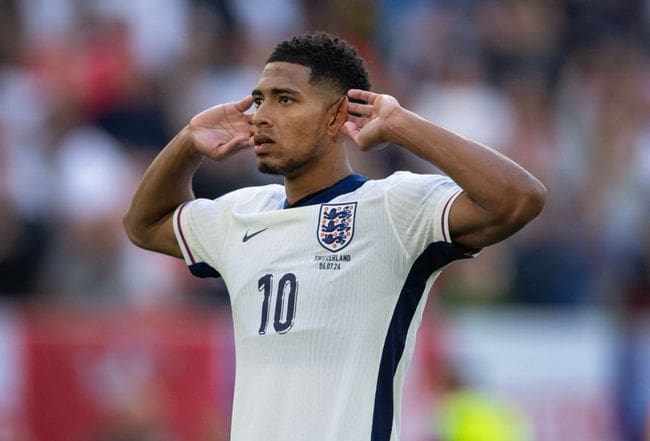 England Euro 2024 squad Jude Bellingham of England celebrates after scoring his penalty during the penalty shoot out of the UEFA EURO 2024 quarter-final match between England and Switzerland at Dusseldorf Arena on July 6, 2024 in Dusseldorf, Germany. (Photo by Visionhaus/Getty Images)