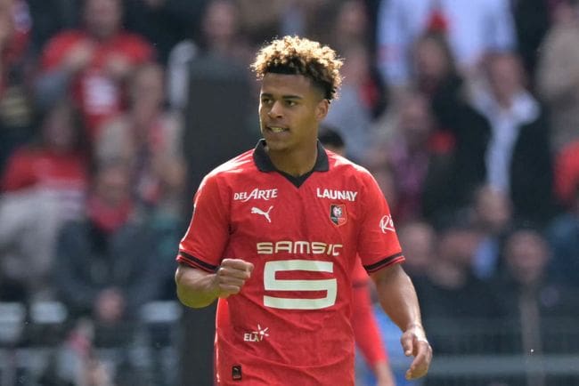 Tottenham target Desire Doue reacts during the French L1 football match between FC Lorient and Toulouse FC at Stade du Moustoir in Lorient, western France, on April 28, 2024. (Photo by Lou BENOIST / AFP) (Photo by LOU BENOIST/AFP via Getty Images)