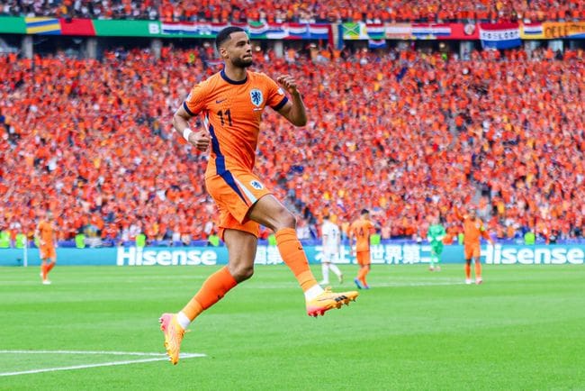 Euro 2024 top scorers Cody Gakpo of the Netherlands celebrates after scoring his teams first goal during the Group D - UEFA EURO 2024 match between Netherlands and Austria at Olympiastadion on June 25, 2024 in Berlin, Germany. (Photo by Peter Lous/BSR Agency/Getty Images)