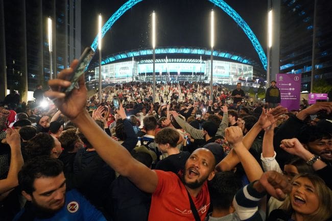 England fans celebrate outside Wembley Stadium during Euro 2020