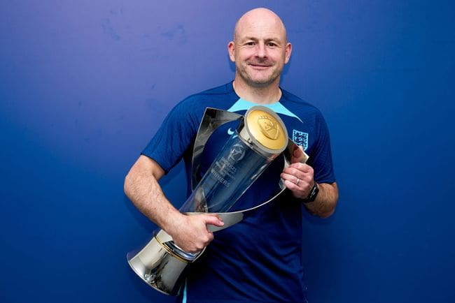 Lee Carsley holding the UEFA Under-21 Euro 2023 trophy