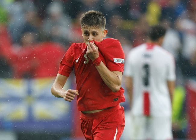 Arda Güler celebrates after scoring for Turkey against Georgia at Euro 2024.