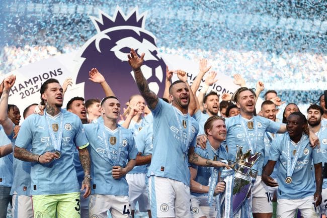 Kyle Walker of Manchester City lifts the Premier League Trophy after their team's victory during the Premier League match between Manchester City and West Ham United at Etihad Stadium on May 19, 2024 in Manchester, England. (Photo by Naomi Baker/Getty Images)