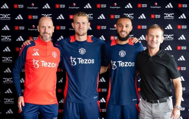 MANCHESTER, ENGLAND - AUGUST 13: (EXCLUSIVE COVERAGE) Matthijs de Ligt and Noussair Mazraoui of Manchester United pose with Manager Erik ten Hag and Sporting Director Dan Ashworth after signing for the club at Carrington Training Ground on August 13, 2024 in Manchester, England. (Photo by Manchester United/Manchester United via Getty Images)