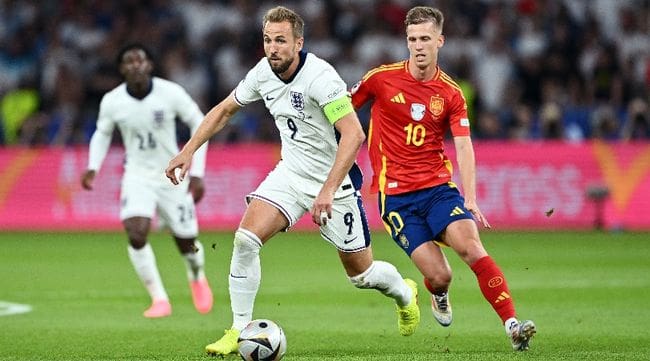 England's Harry Kane and Spain's Dani Olmo compete for the ball in the final of Euro 2024.