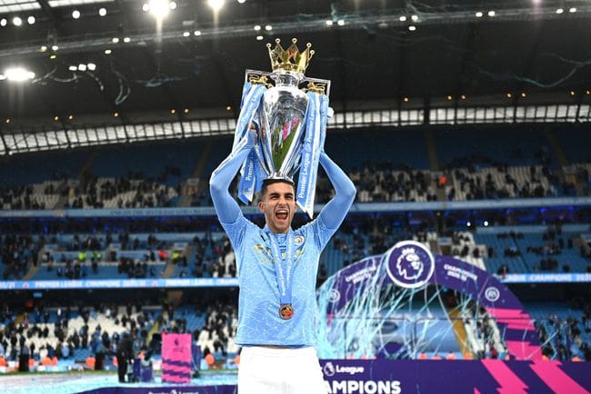 Newcastle United MANCHESTER, ENGLAND - MAY 23: Ferran Torres of Manchester City celebrates with the Premier League Trophy as Manchester City are presented with the Trophy as they win the league following the Premier League match between Manchester City and Everton at Etihad Stadium on May 23, 2021 in Manchester, England. A limited number of fans will be allowed into Premier League stadiums as Coronavirus restrictions begin to ease in the UK. (Photo by Michael Regan/Getty Images)