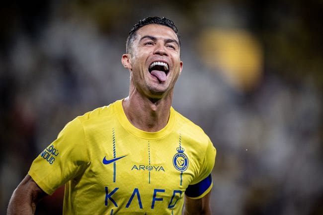 Cristiano Ronaldo celebrates Manchester United after scoring for Al-Nassr against Al-Wehda in the Saudi Pro League in May 2024.