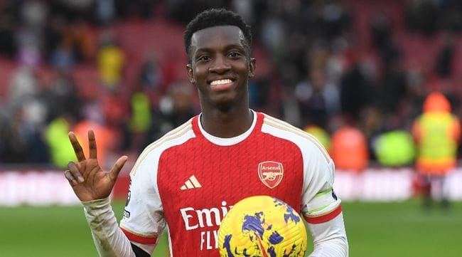 Arsenal's Eddie Nketiah celebates with the match ball after scoring a hat-trick against Sheffield United in October 2023.