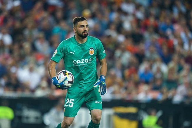 Giorgi Mamardashvili of Valecia in action during the Santander League match between Valencia CF and Fc Barcelona at the Mestalla Stadium on August 29, 2022, in Valencia, Spain.