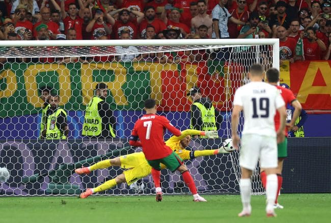 Cristiano Ronaldo sees his spot kick saved at Euro 2024