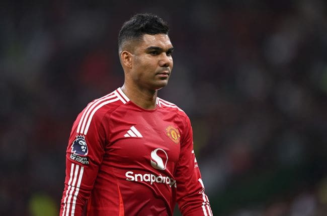 MANCHESTER, ENGLAND - SEPTEMBER 01: Casemiro of Manchester United looks dejected, as they walk off for half time during the Premier League match between Manchester United FC and Liverpool FC at Old Trafford on September 01, 2024 in Manchester, England. (Photo by Shaun Botterill/Getty Images)