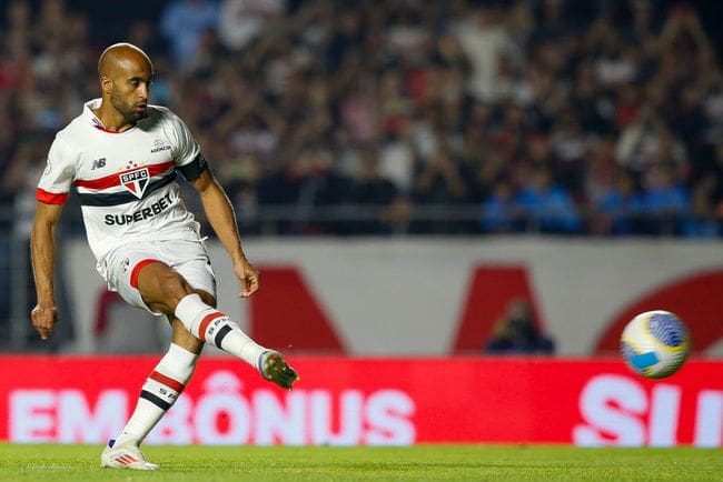 SAO PAULO, BRAZIL - JULY 24: Lucas Moura of Sao Paulo takes a penalty kick during a match between Sao Paulo and Botafogo as part of Brasileirao Series A 2024 at MorumBIS on July 24, 2024 in Sao Paulo, Brazil. (Photo by Miguel Schincariol/Getty Images)