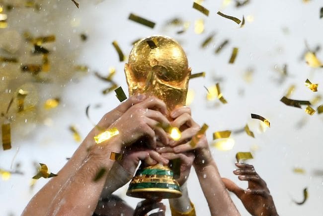 France's players lift the Fifa World Cup trophy after the Russia 2018 World Cup final football match between France and Croatia at the Luzhniki Stadium in Moscow on July 15, 2018. - France won the World Cup for the second time in their history after beating Croatia 4-2 in the final in Moscow's Luzhniki Stadium on Sunday. (Photo by Jewel SAMAD / AFP) / RESTRICTED TO EDITORIAL USE - NO MOBILE PUSH ALERTS/DOWNLOADS (Photo credit should read JEWEL SAMAD/AFP via Getty Images)