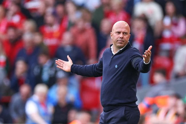 Arne Slot manager / head coach of Liverpool reacts during the Premier League match between Liverpool FC and Nottingham Forest FC at Anfield on September 14, 2024 in Liverpool, England.