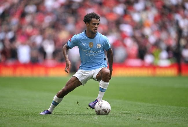 LONDON, ENGLAND - AUGUST 10: Oscar Bobb of Manchester City in action during the 2024 FA Community Shield match between Manchester United and Manchester City at Wembley Stadium on August 10, 2024 in London, England. (Photo by Stu Forster/Getty Images)