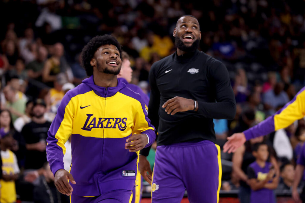 In their first preseason game against the Lakers, LeBron James and Bronny promote court.